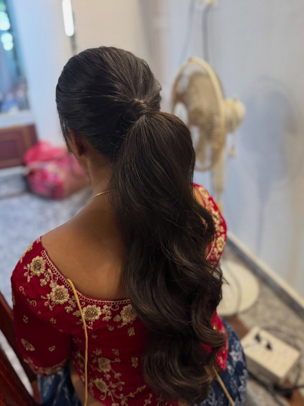 High ponytail with soft waves