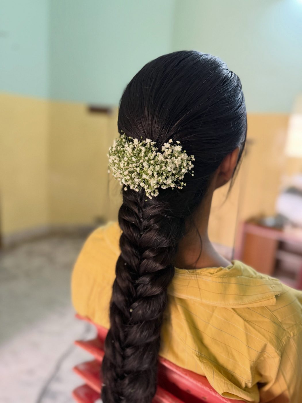 Classic plait with white flowers